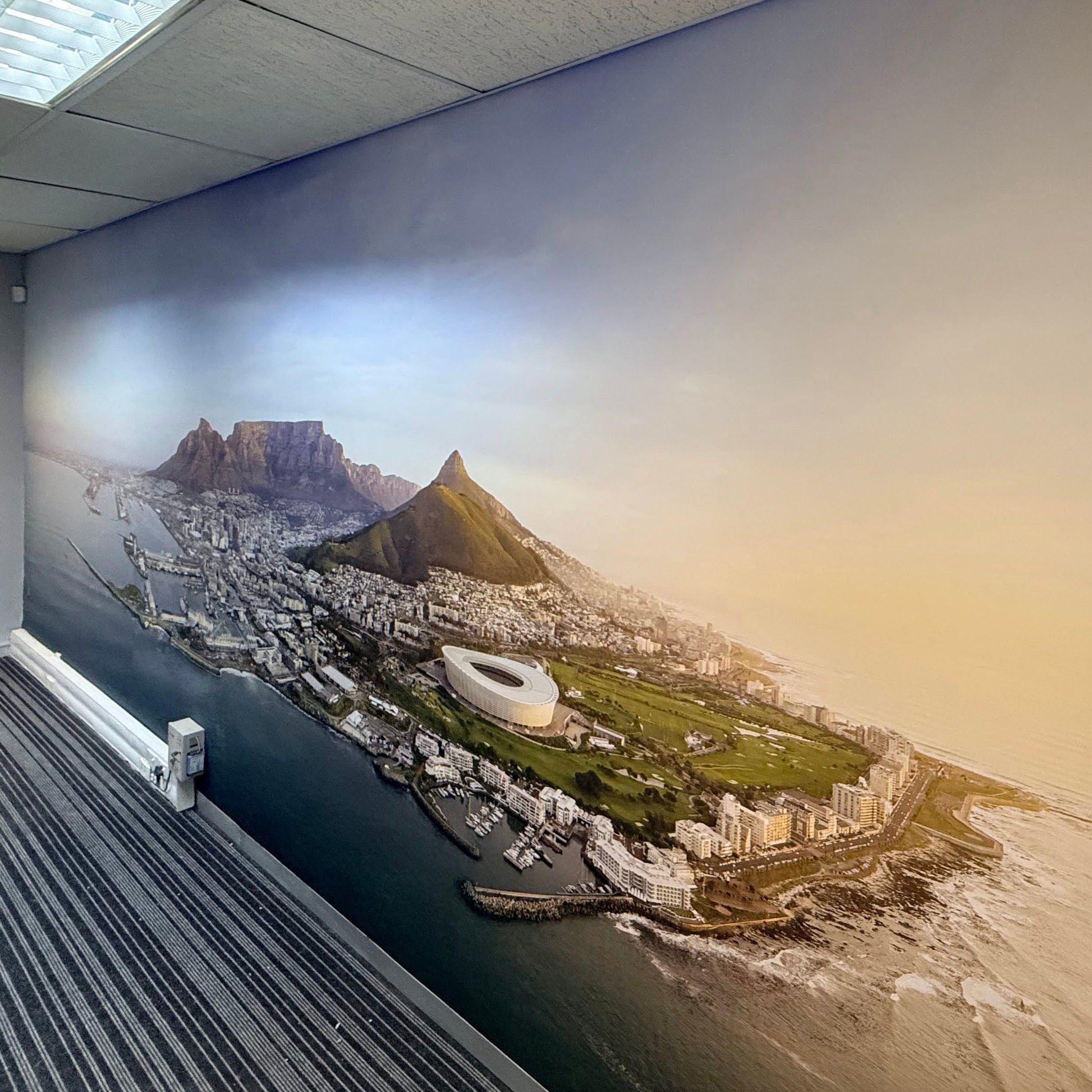 Custom panoramic Cape Town wallpaper installation in a commercial office